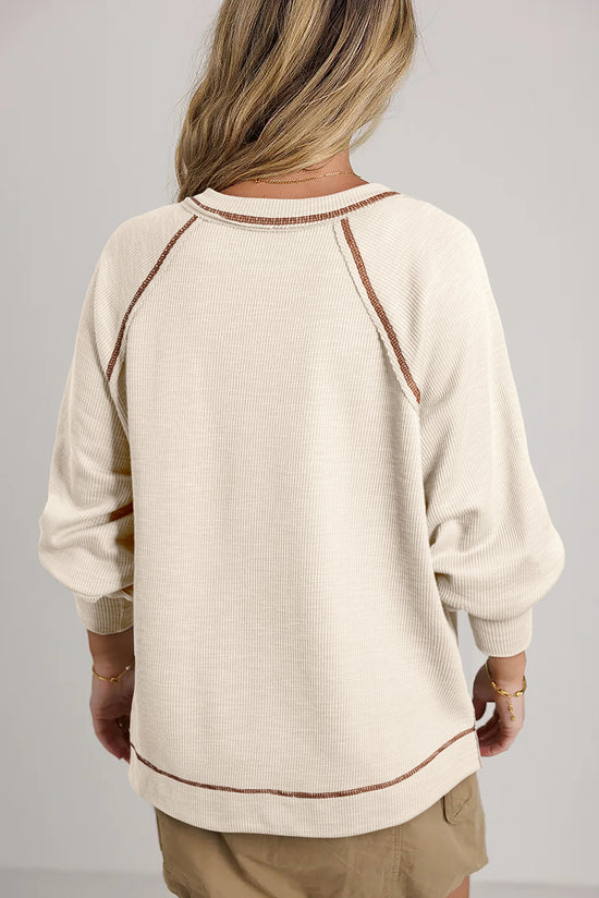 Haut pull beige en tricot texturé *