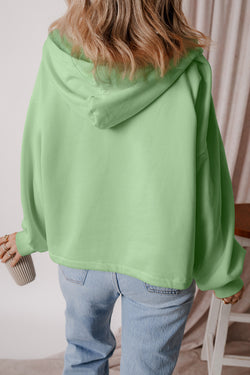 Loose fitting half zip hoodie with kangaroo pockets lined with smoke green fleece