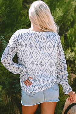 Sky blue blouse with gathered geometric print with puffy sleeves and V -neck