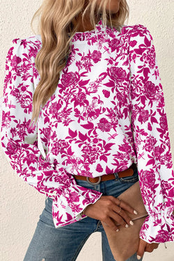 Pink blouse with floral print and ruffle sleeves with lock hole on the back