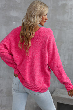 Cardigan pull avec poches sur le devant et boutons roses