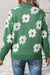 Suéter verde con motivo floral y medio zip *