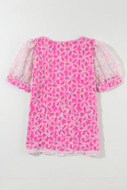 Blouse with short puffs in bonbon flowery knit