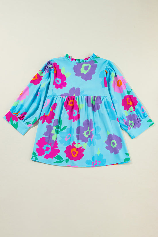 Babydoll blouse with floral print and tight -sized V -shaped V -neck light