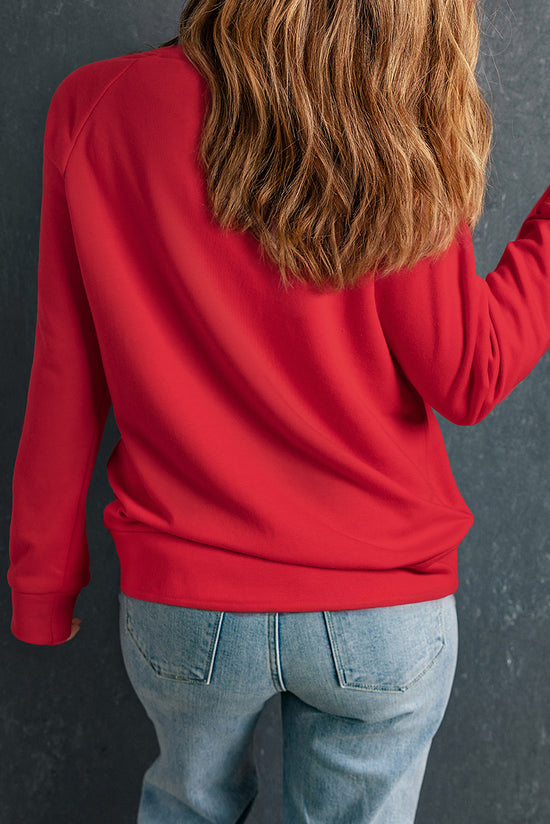 Solid red crew neck sweatshirt with raglan sleeves