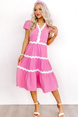 Mid-length fluid dress with short puffing sleeves and candy ric rac border