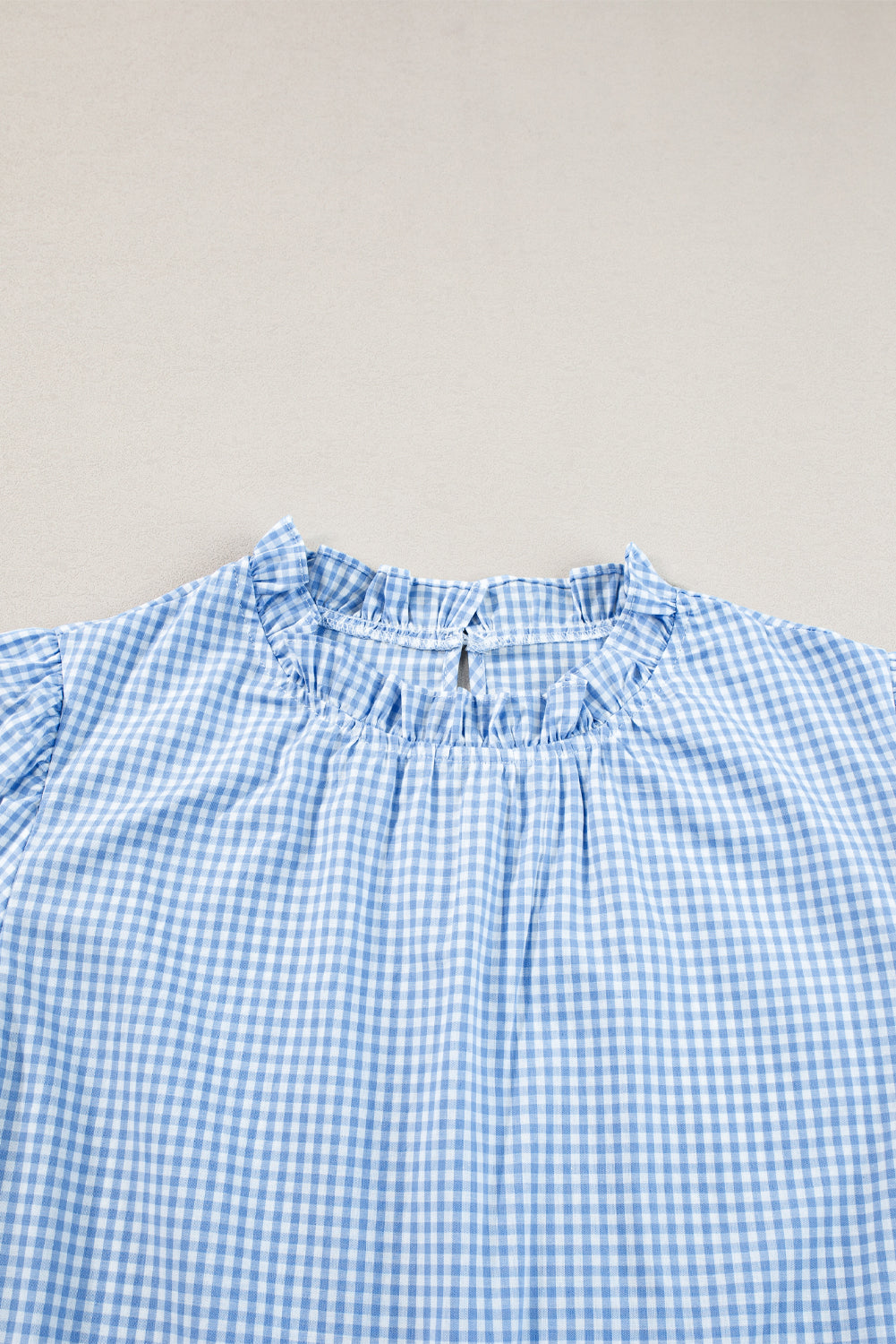 Hellblau Gingham Blumenbluse bestickte Puffhülle