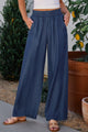 High-waisted wide-leg jeans with ruffles and side pockets in sail blue