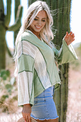 Grass green high low loose top with crochet details and exposed seams