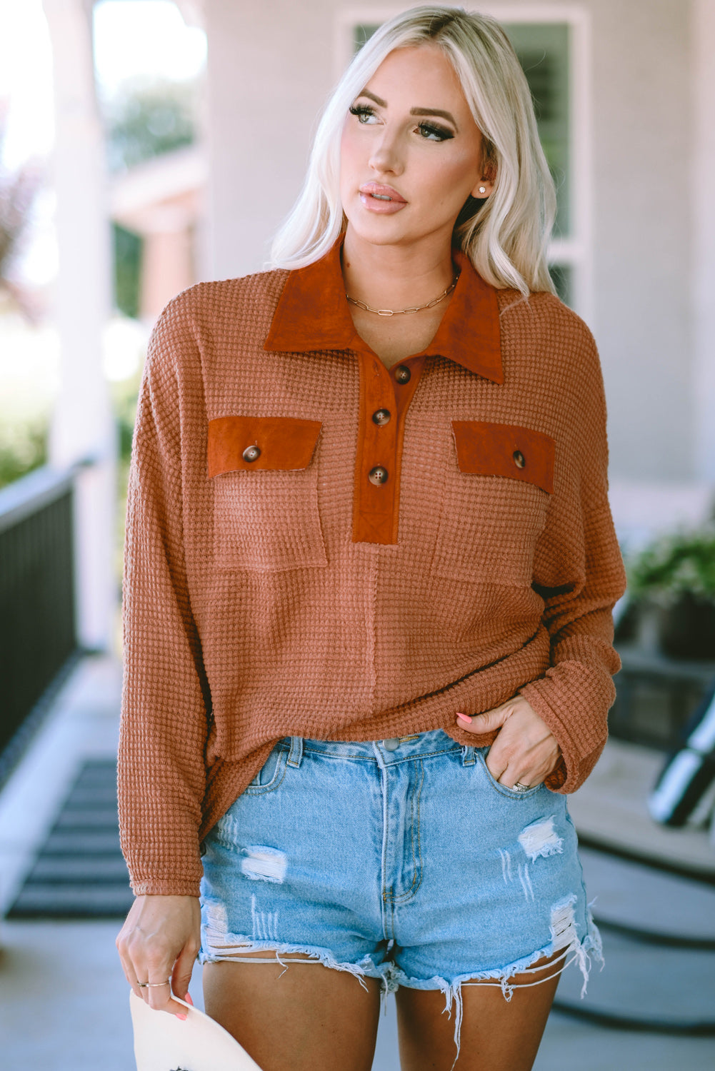 Brown waffle knit long sleeve top with buttons and contrast trim