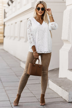 Ample white high with V -neck and crochet floral lace