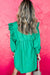 Ruffle mini con ruido y mangas de 3/4 en V-cuolar en V