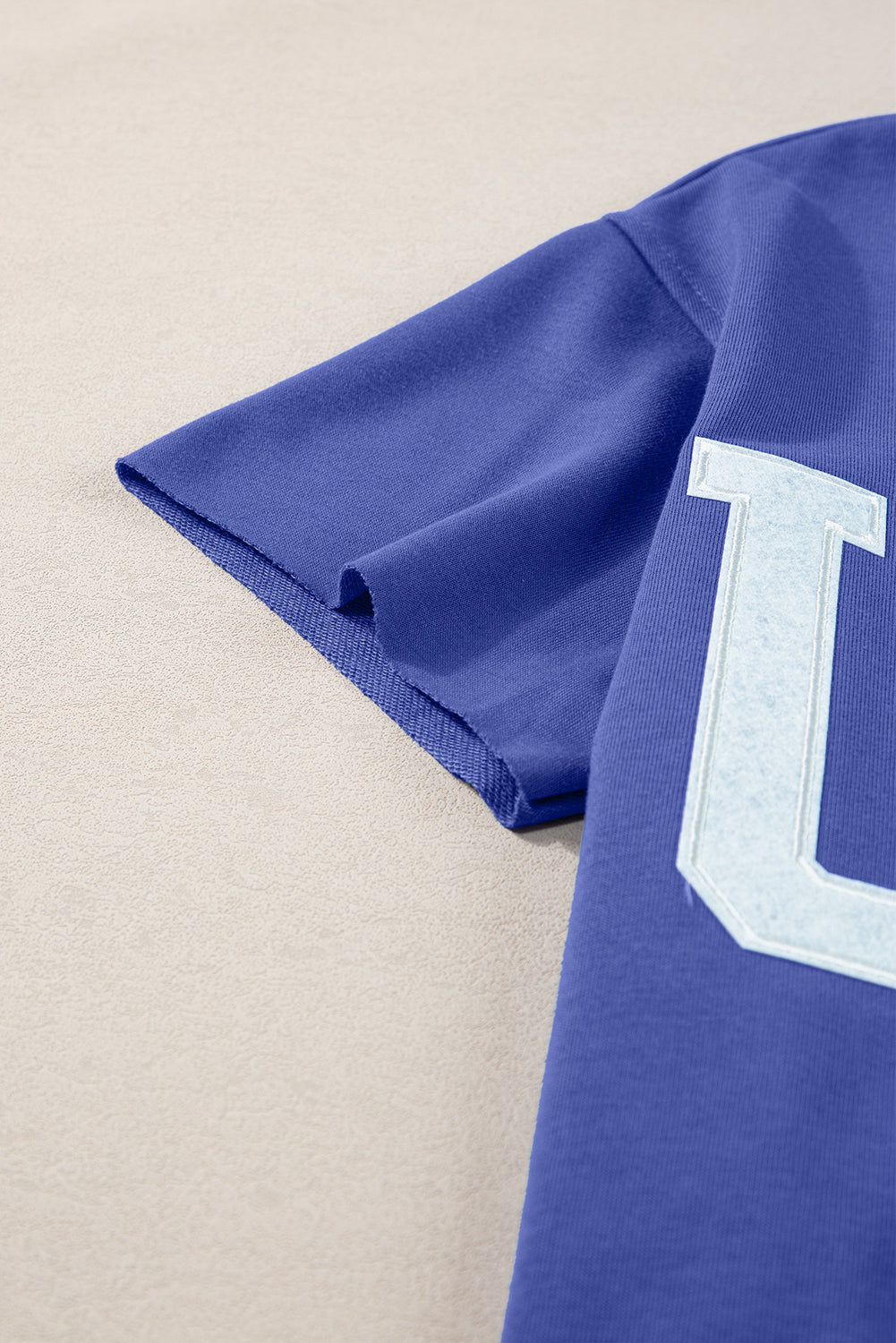 Dark blue loose t-shirt with lettering USA and notched collar