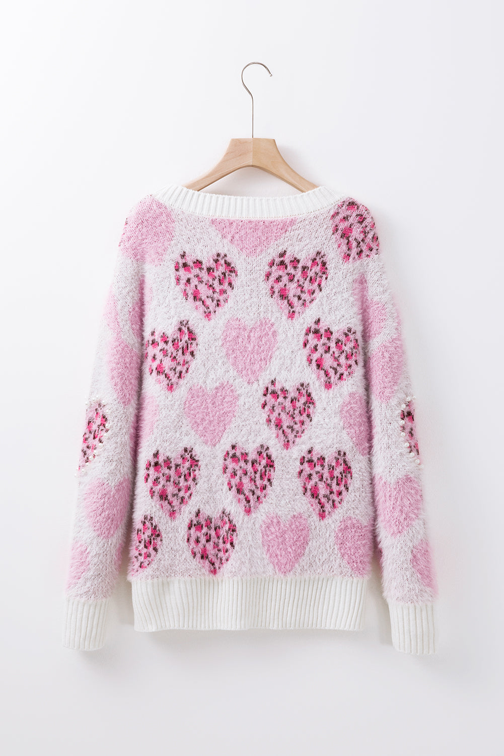 Fluffy sweater with pearl ribbed trim and leopard print and pink heart