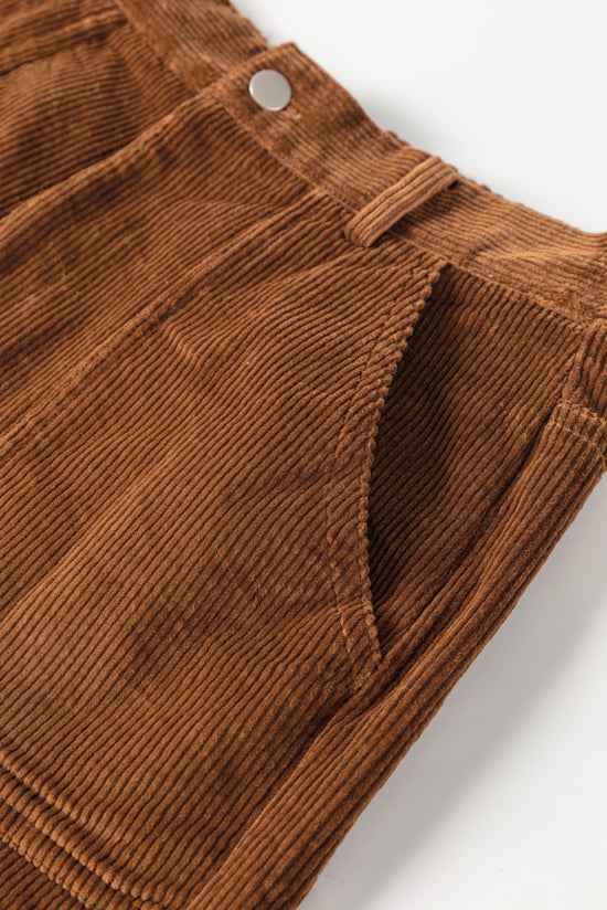 Vintage brown corduroy shorts with elastic waist and back pockets