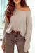 Loose ribbed knit top with dropped shoulders and cuffs in beige lettuce