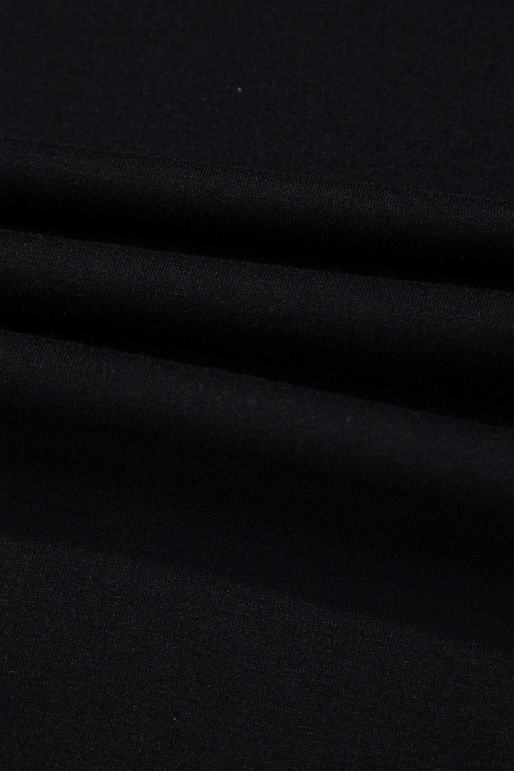 T-shirt noir asymétrique croisé à une épaule