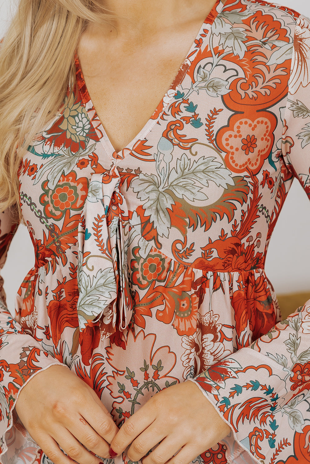 Chemisier orange à imprimé floral et col en V *-A WOMAN WE LOVE