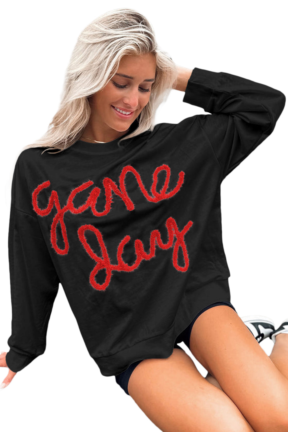 Sudadera gráfica negra con hombros caídos Día del juego de oropel