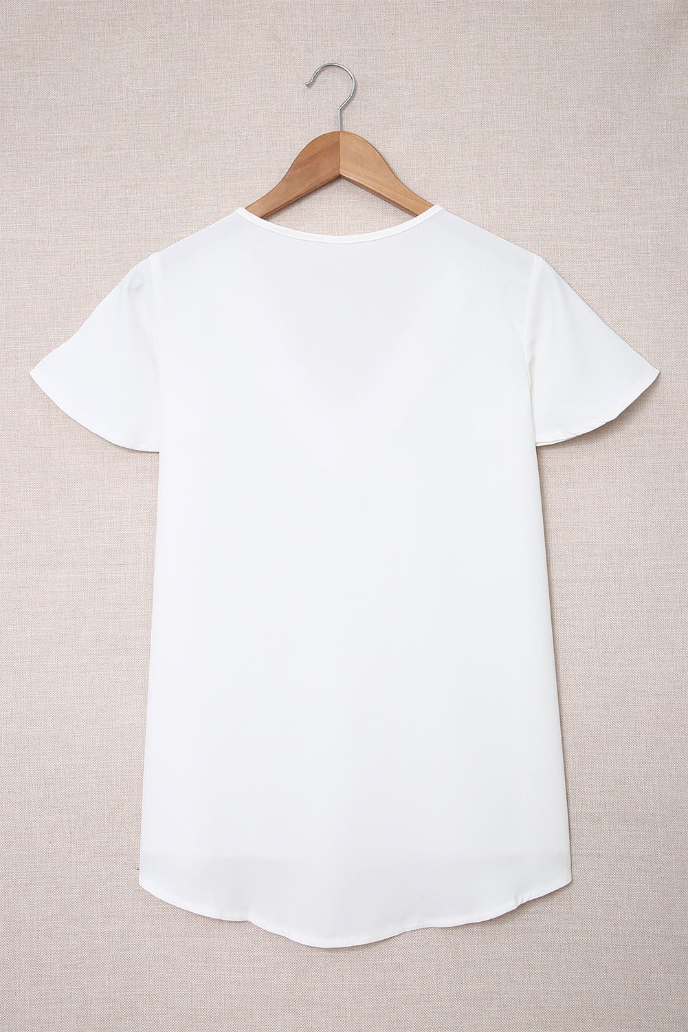 T-shirt blanc couche en V