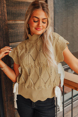 Light beige heevered sealed collar sweater with a boasted edge