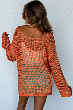 Orange tunic with handle knitting sleeves open to crochet