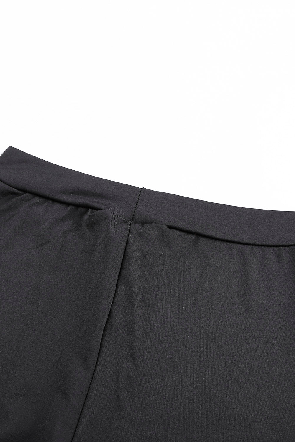 Legging de lacet de grommet noir à l'avant