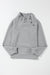 Grey textured sweatshirt with mock neck and asymmetrical buttons