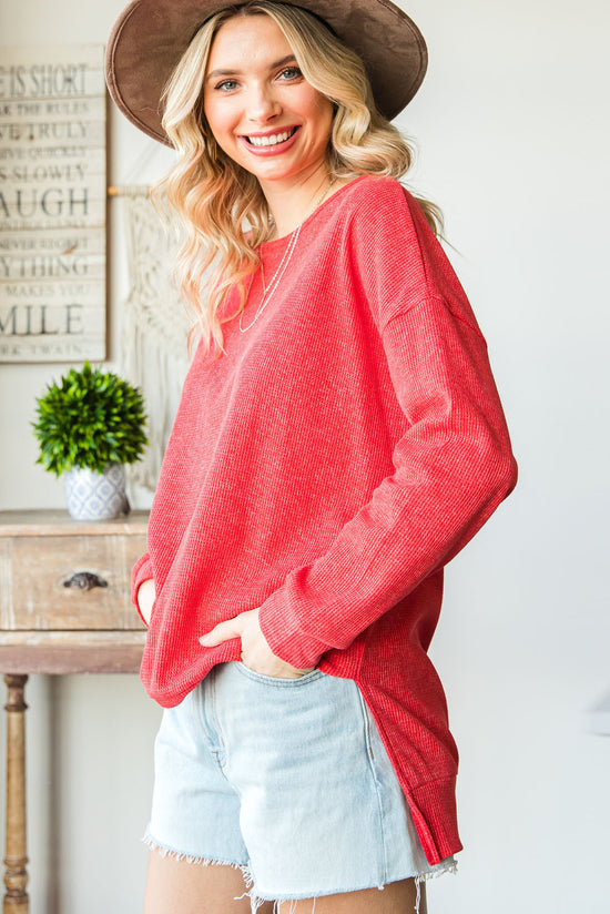 High swelling sweater with side slit