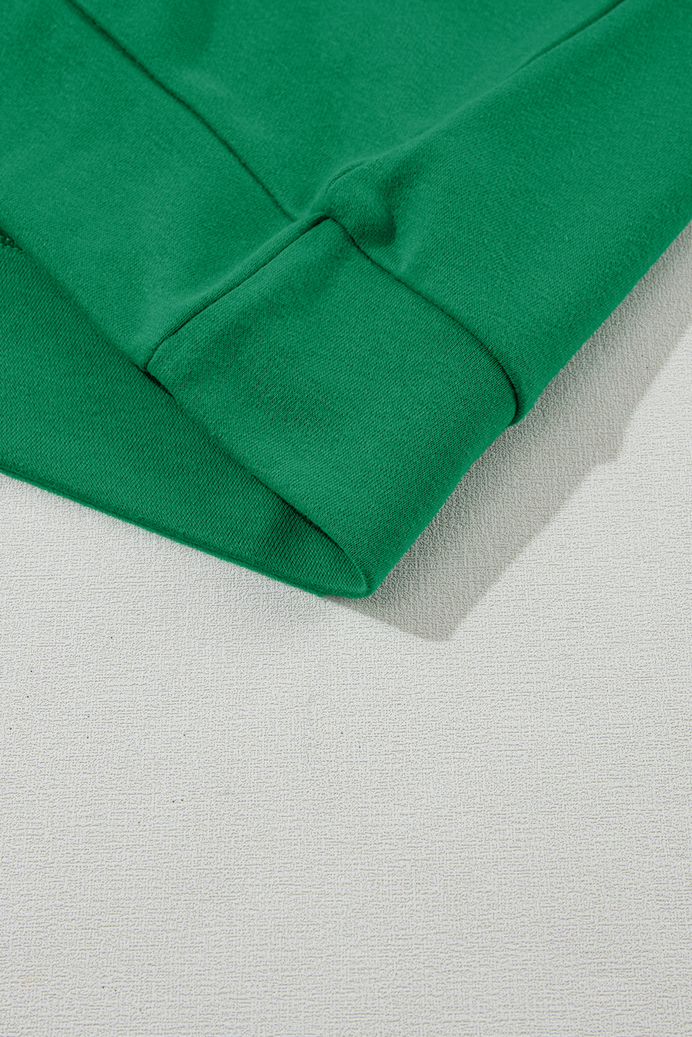 Plain green crew neck sweatshirt with raglan sleeves