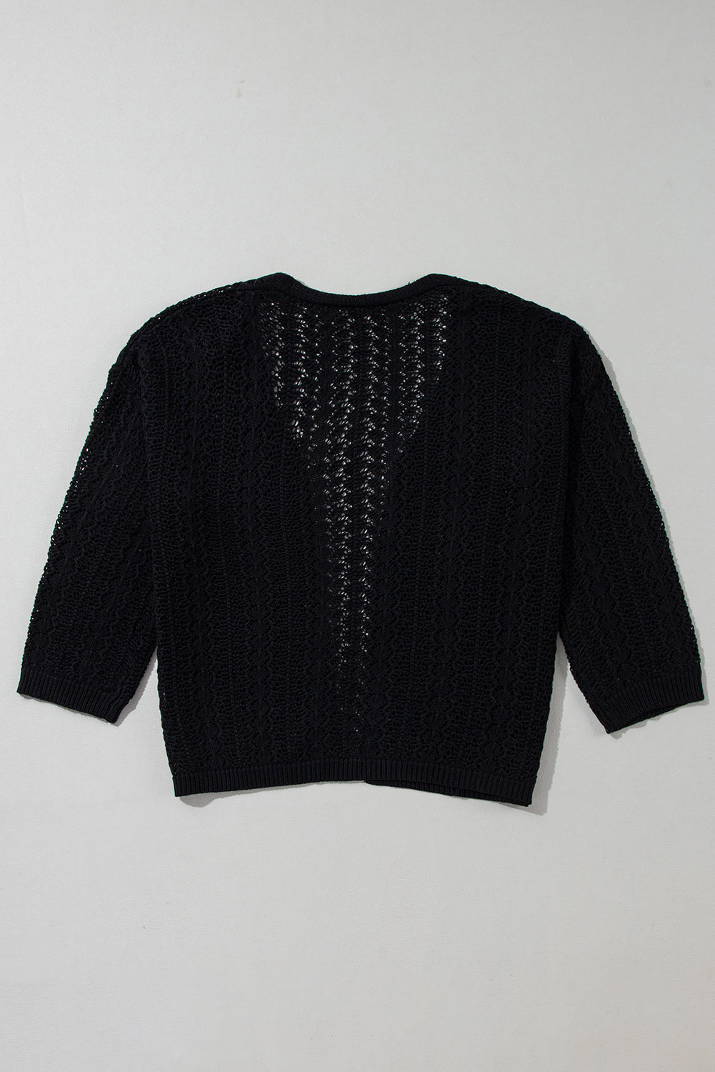 Black open front cardigan in openwork knit with dropped shoulders