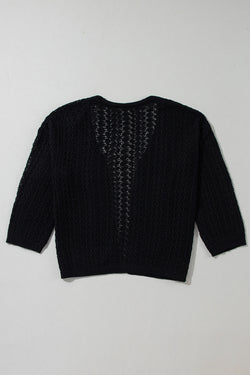 Cardigan noir ouvert sur le devant *