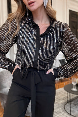 Black shirt buttoned with fringes and sequins, slim cut