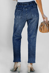 Pantalon de jogging en denim à poches rondes et vieilli bleu foncé