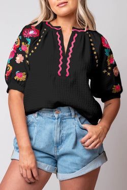 Black textured blouse with puffy sleeves and Ricrac floral embroidery