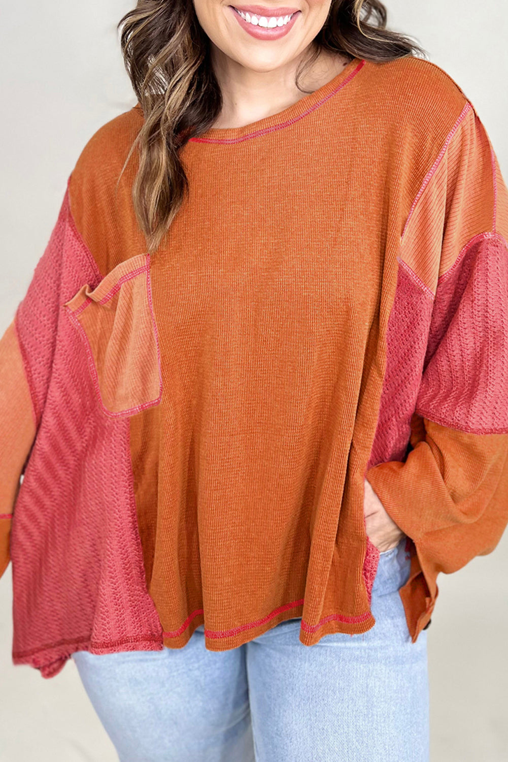 Haut orange en tricot texturé avec bloc de couleurs et poche poitrine en patchwork de grande taille