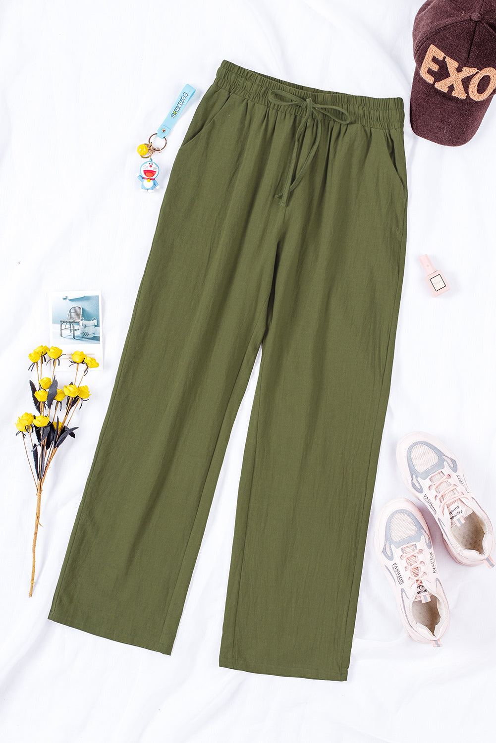 Pants with drawstring and elastic waist pockets, long straight legs green