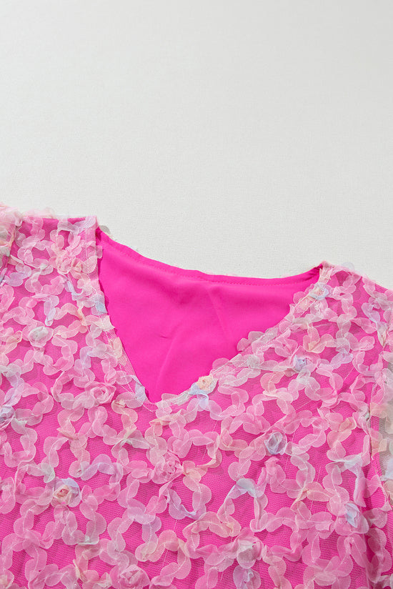 Blouse with short puffs in bonbon flowery knit