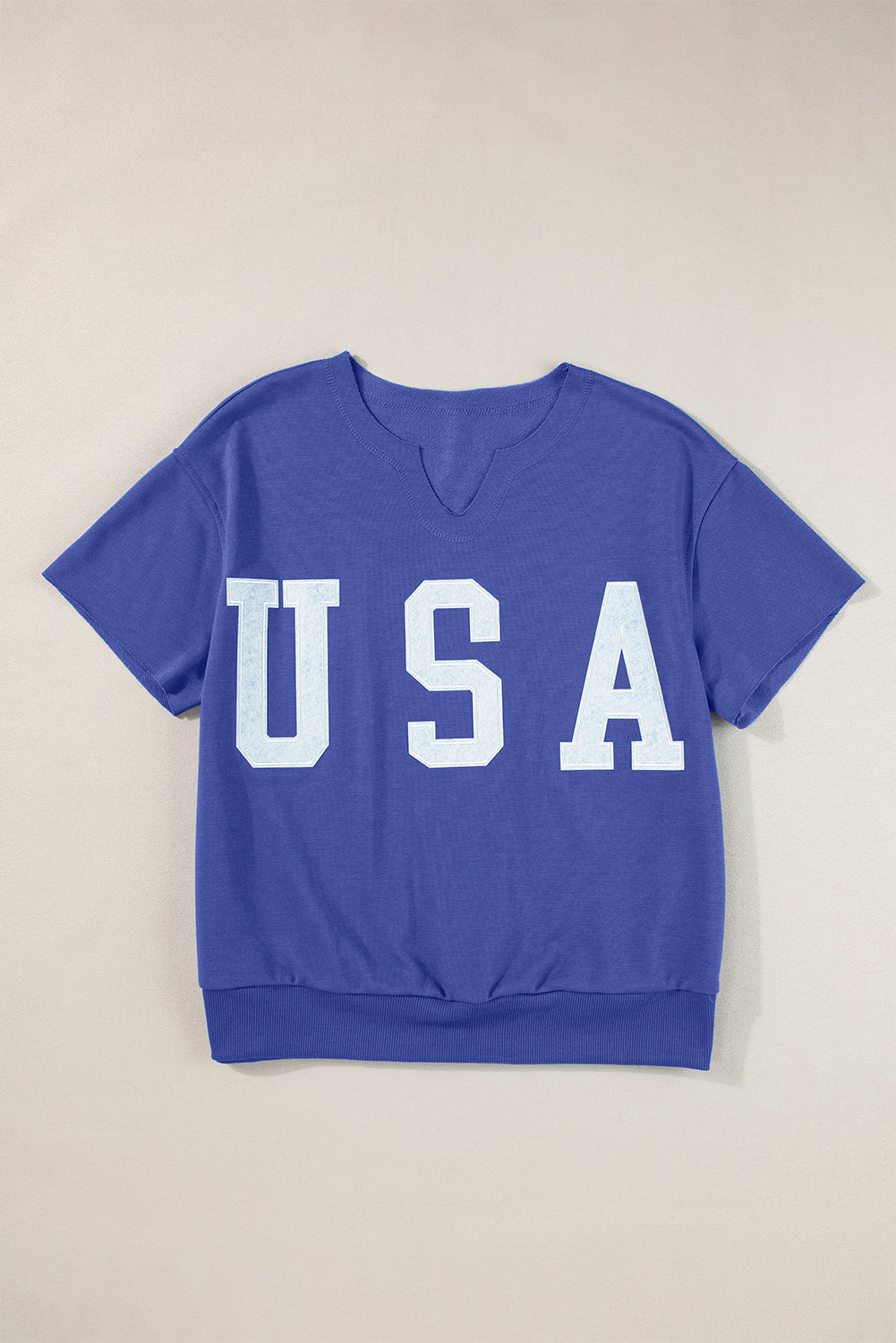 T-shirt ample bleu foncé avec lettrage USA et col cranté