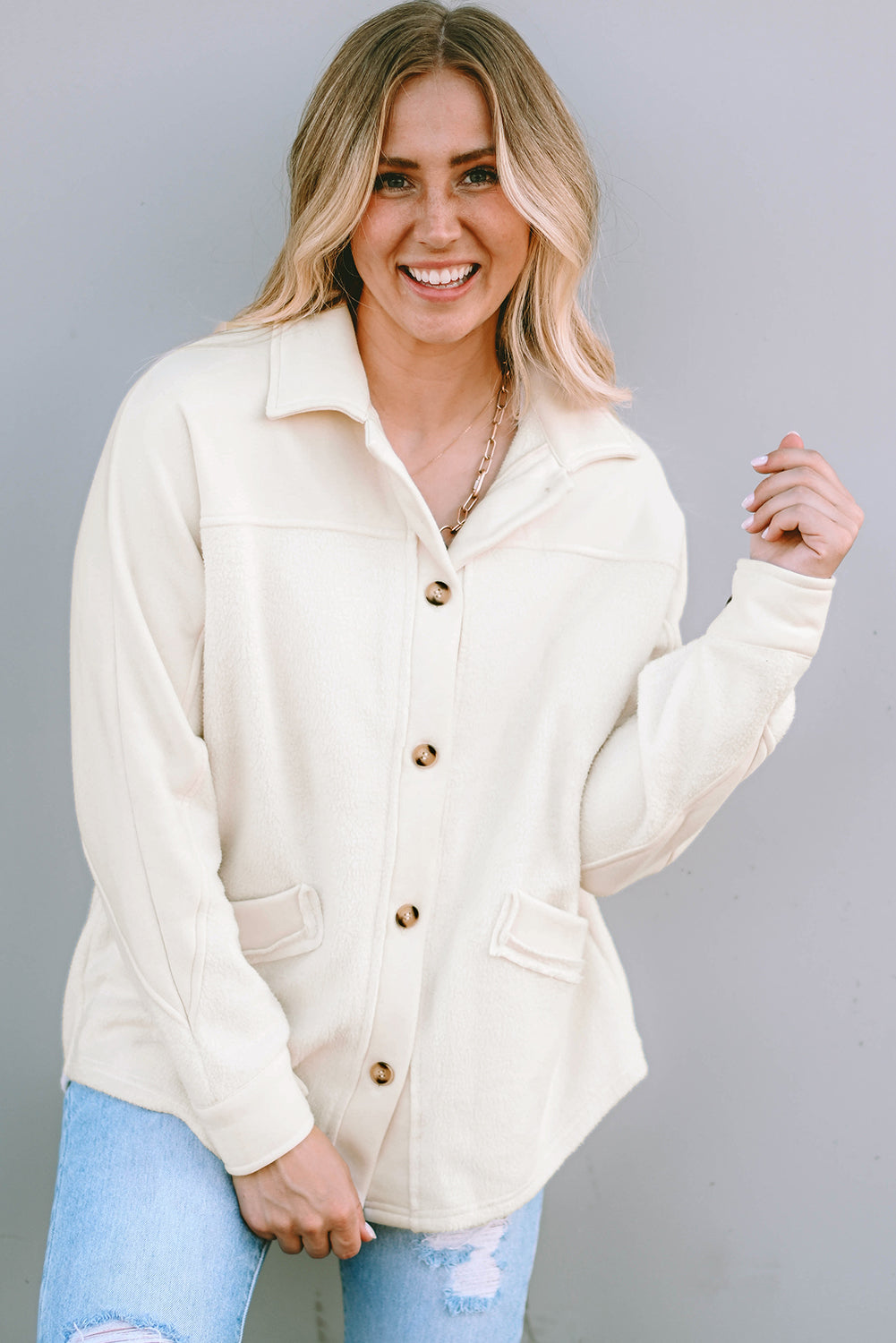 Beige buttoned jacket with pocket and raw hem