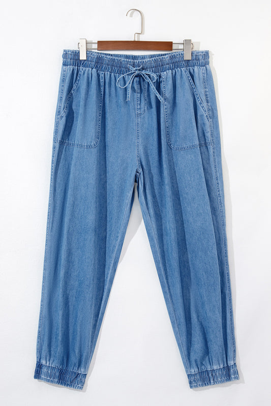 Pantalon de jogging en denim bleu crépuscule avec poches à la taille et cordon de serrage de grande taille