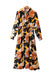 Robe orange à manches longues et col noué à imprimé floral