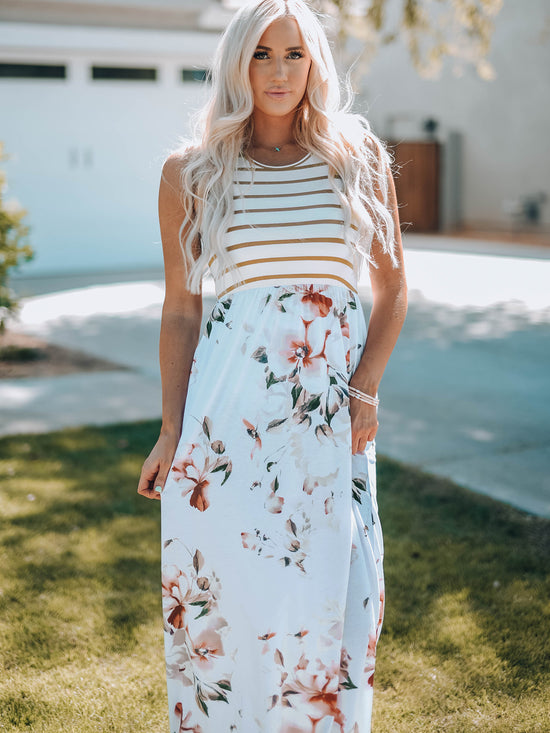 Long white dress without sleeve with floral print and stripes with pocket