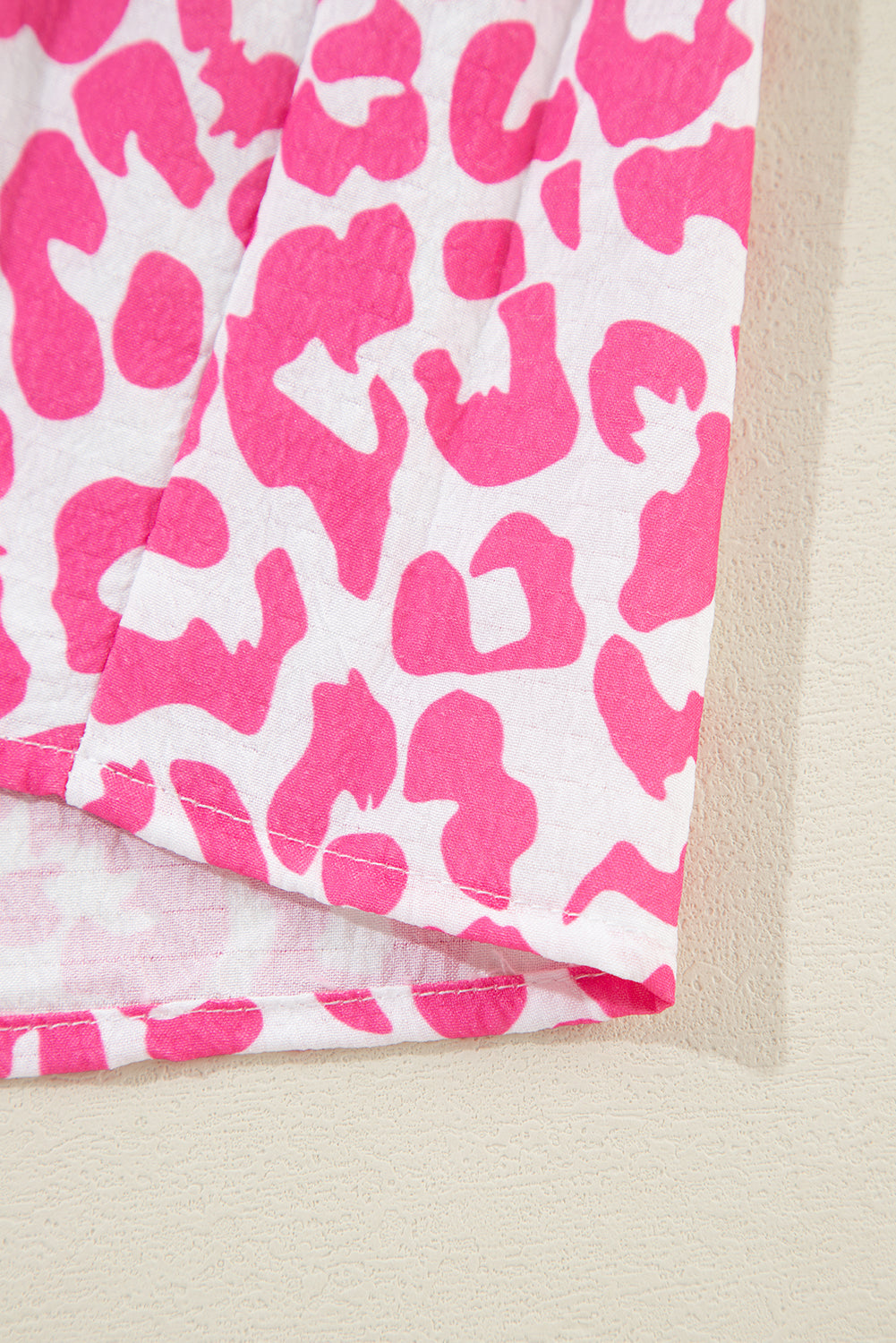 Mini-robe rose vif imprimée léopard *