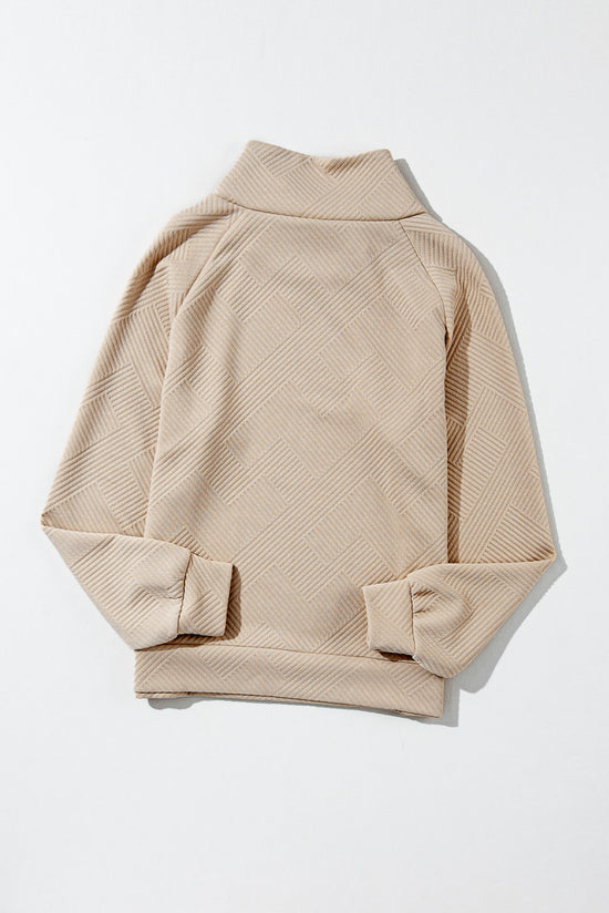 Apricot textured mock neck sweatshirt with asymmetrical buttons