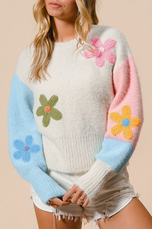 Multicolored sweater with dropped shoulders and multicolored floral embroidery