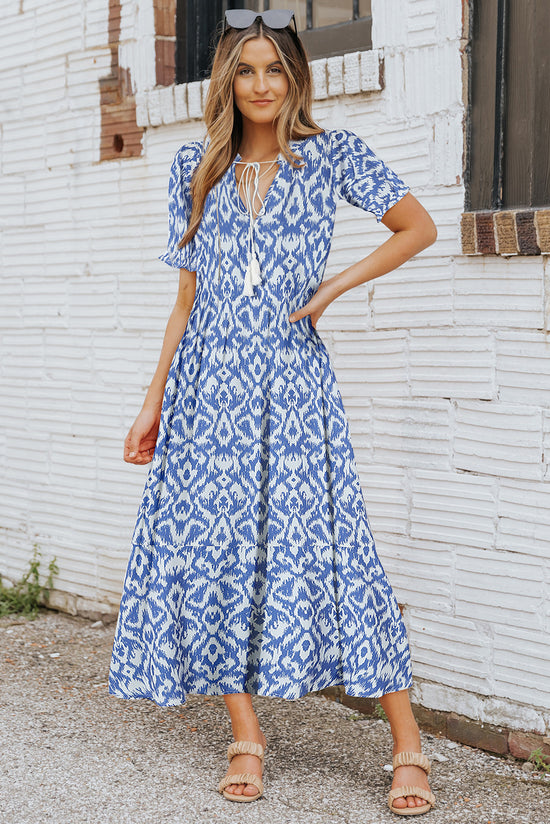 Long relaxed dress with geometric sky blue print with v -neck collar