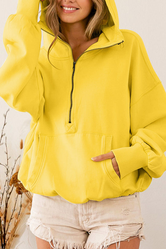 Yellow zip-up hoodie with kangaroo pocket and ribbed trim