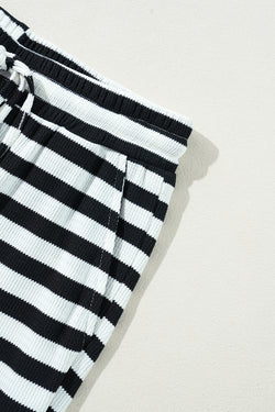 Striped flared pants with stripes and lace -ups with black waist