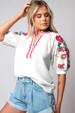 White textured blouse with puffy sleeves and Ricrac floral embroidery